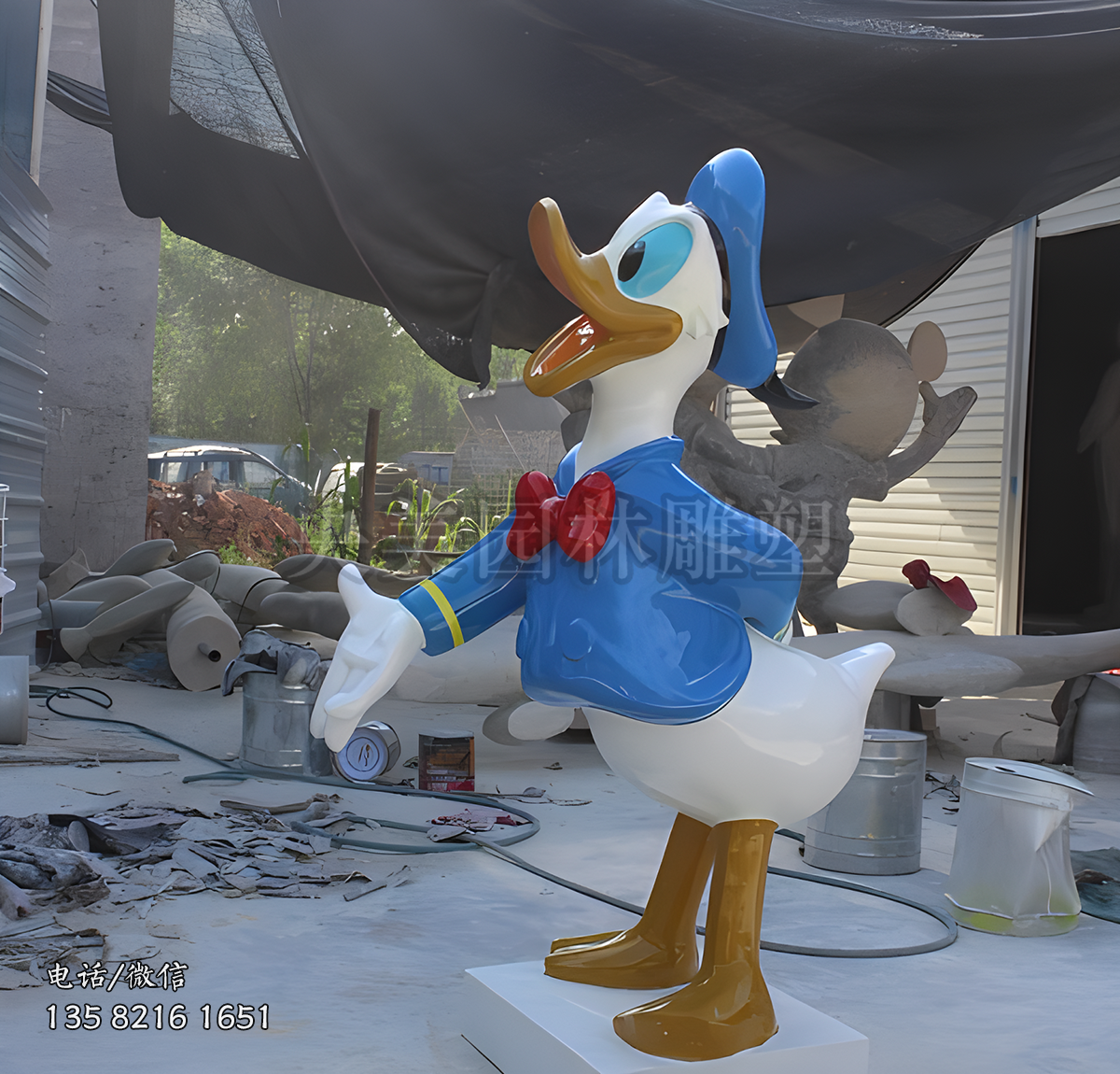 “有請”唐老鴨迎賓卡通動漫雕塑